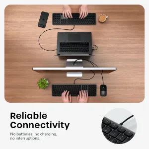Clavier Satechi LX3 Slim USB-C dans une configuration de bureau filaire, présenté avec des touches grand format et un pavé numérique.