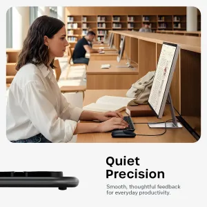 Clavier Satechi LX3 Slim USB-C avec disposition nordique, montré en situation d’utilisation, avec détail du profil fin