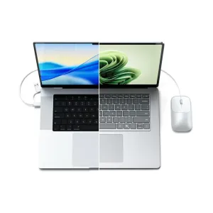 Satechi Slim LX kabelgebundene Maus mit Präzisions-Scrollrad neben einem Laptop in einem Studio-Setup