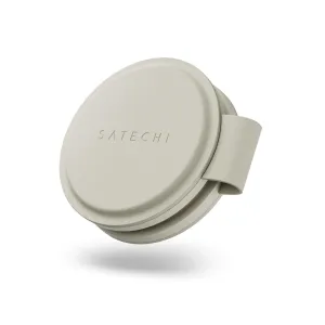 Satechi OntheGo 2-i-1 trådløs lader i sand, med et sammenleggbart rundt design og preget logo
