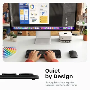 Satechi EX1 Slim trådløst tastatur med nordisk layout vist i et rolig oppsett på en kontorpult