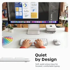 Satechi EX1 Slim trådløst tastatur med nordisk layout vist på et skrivebord, med sideprofil og fremheving av stillegående skriving.