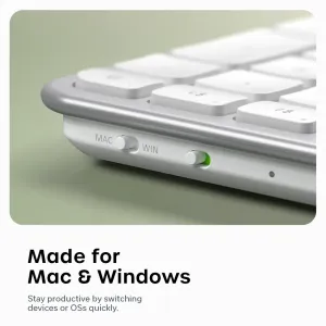 Satechi tunt trådlöst tangentbord med vita tangenter och Mac/Windows-omkopplare för effektivt skrivande i desktop-konfigurationer