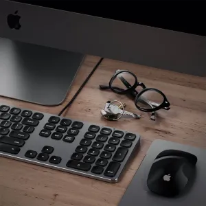 Satechi Nordic layout wired USB keyboard with numeric keypad and Mac function keys on a desk.