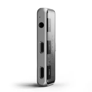 Satechi Mobile XR Hub with Audio avaruusharmaana, jossa näkyvät USB-C-portit ja läpikuultava etupaneeli
