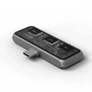 Satechi Mobile XR Hub with Audio, kompakti harmaa USB-C-keskitin, jossa on läpinäkyvä yläpaneeli ja 100 W:n lataus