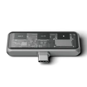 Satechi Mobile XR Hub USB-C-keskitin tähtiharmaana, läpinäkyvällä yläosalla ja näkyvällä piirilevymuotoilulla