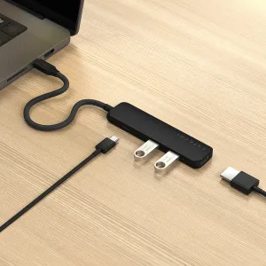 Satechi USB-C-moniporttisovitin punotulla kaapelilla ja USB-A-porteilla kannettavan tietokoneen työpöytäkokoonpanossa