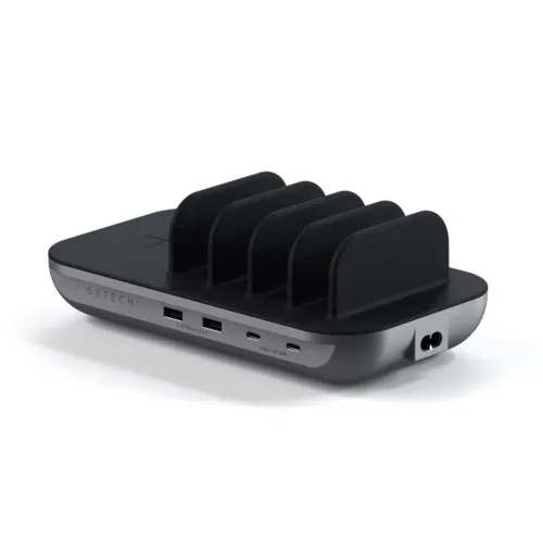 Satechi Dock5 charging station with black top, four compartments, two USB-A and two USB-C on the front and power input on the side with Qi cross.