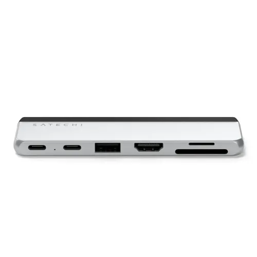 Silver colored Satechi dual USB-C hub seen from the front with two USB-C, LED, USB-A, HDMI, microSD and SD card slots.