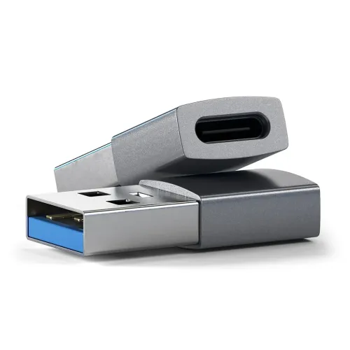 USB-A to USB-C adapter in space gray, two units stacked, with USB-A male with blue insert and USB-C female in close-up in focus.
