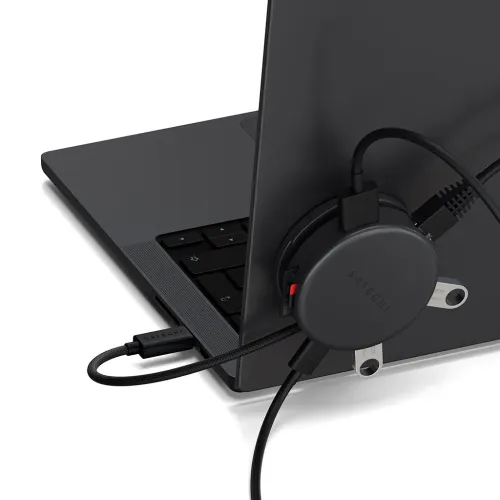 Satechi OntheGo 7-in-1 multiport adapter mounted on a laptop, with braided cable and connected ports