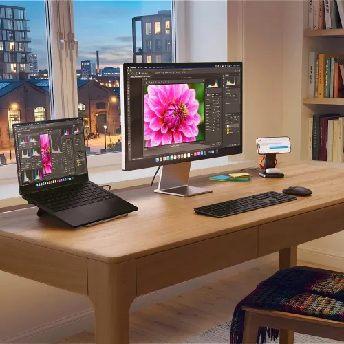 Satechi EX3 slim wireless keyboard with numpad on a desk in a home office setup