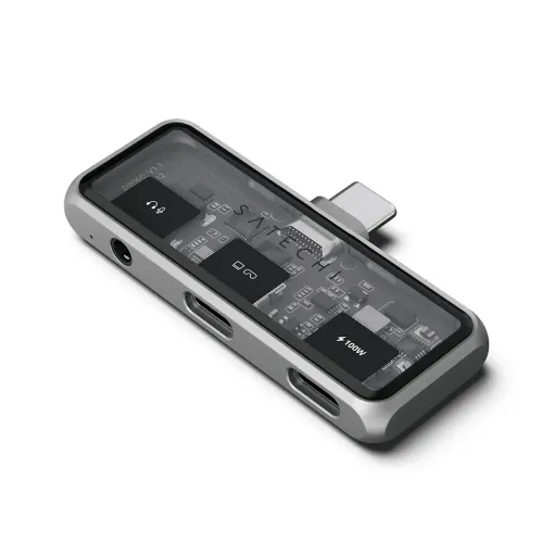 Satechi Mobile XR Hub with Audio tähtiharmaana, jossa on USB-C-liitin, näkyvät portit ja läpinäkyvä yläpaneeli.